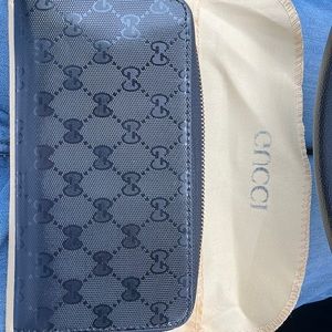 Black leather Gucci clutch monogrammed